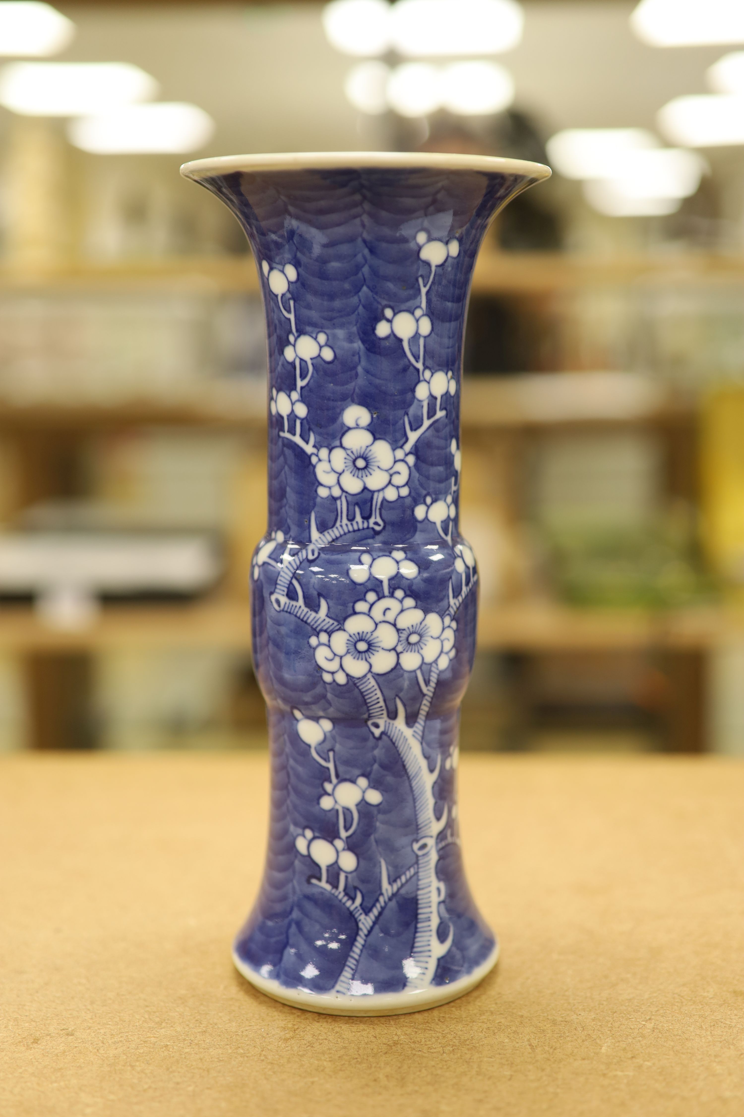 A pair of late 19th century Chinese blue and white prunus vases